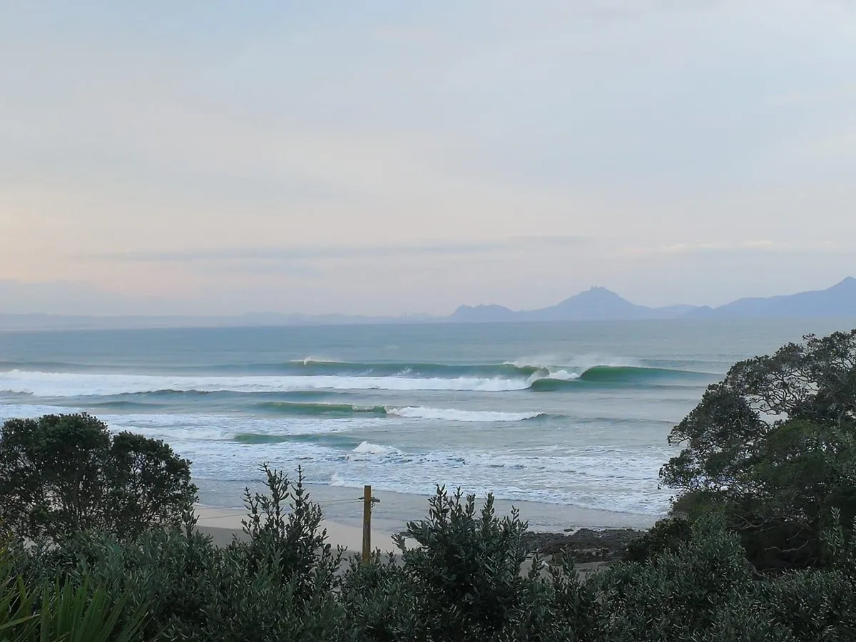 Long empty stretch of Waipu beach