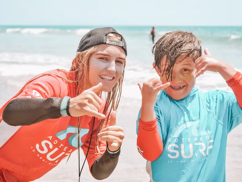 Instructor and camper celebrating a session