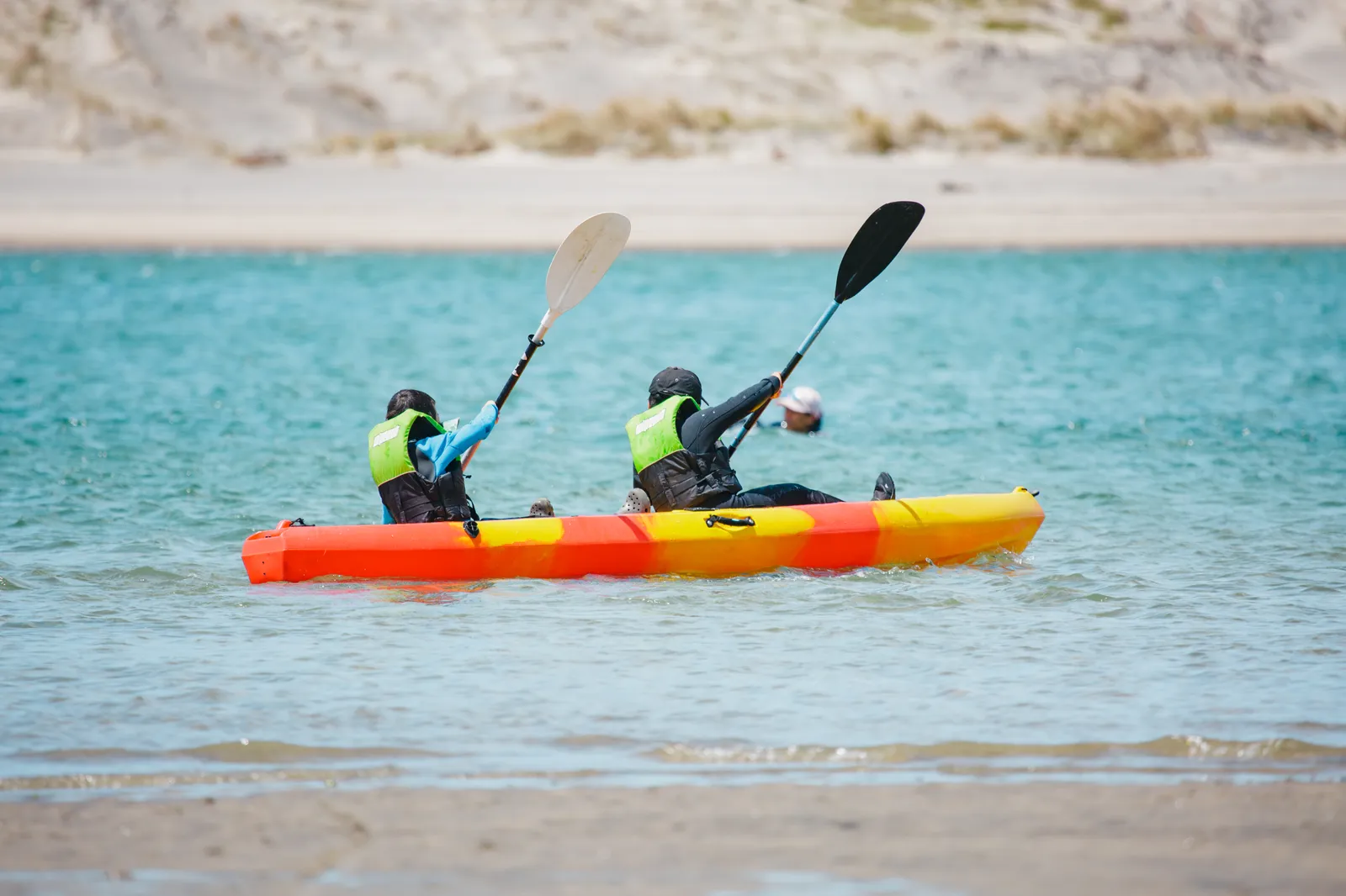 Kids kayaking on the Mangawhai estuary