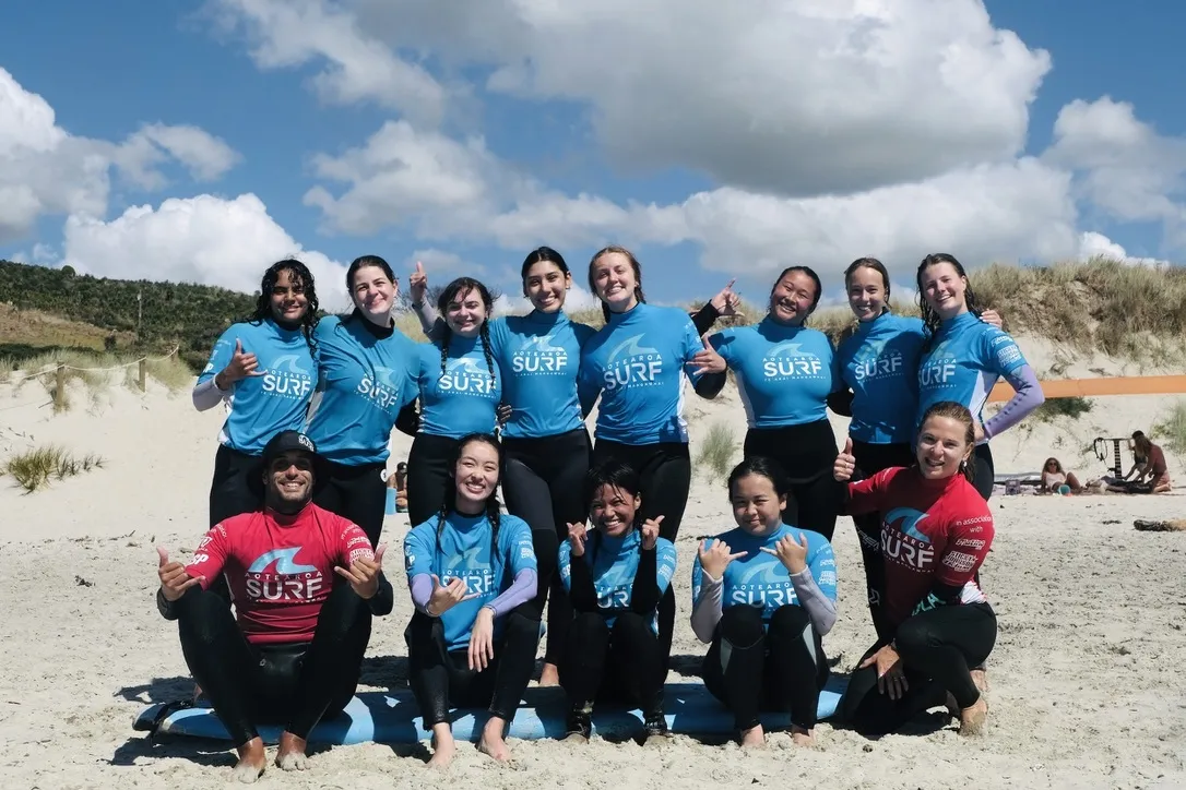 Crew celebrating together after a surf