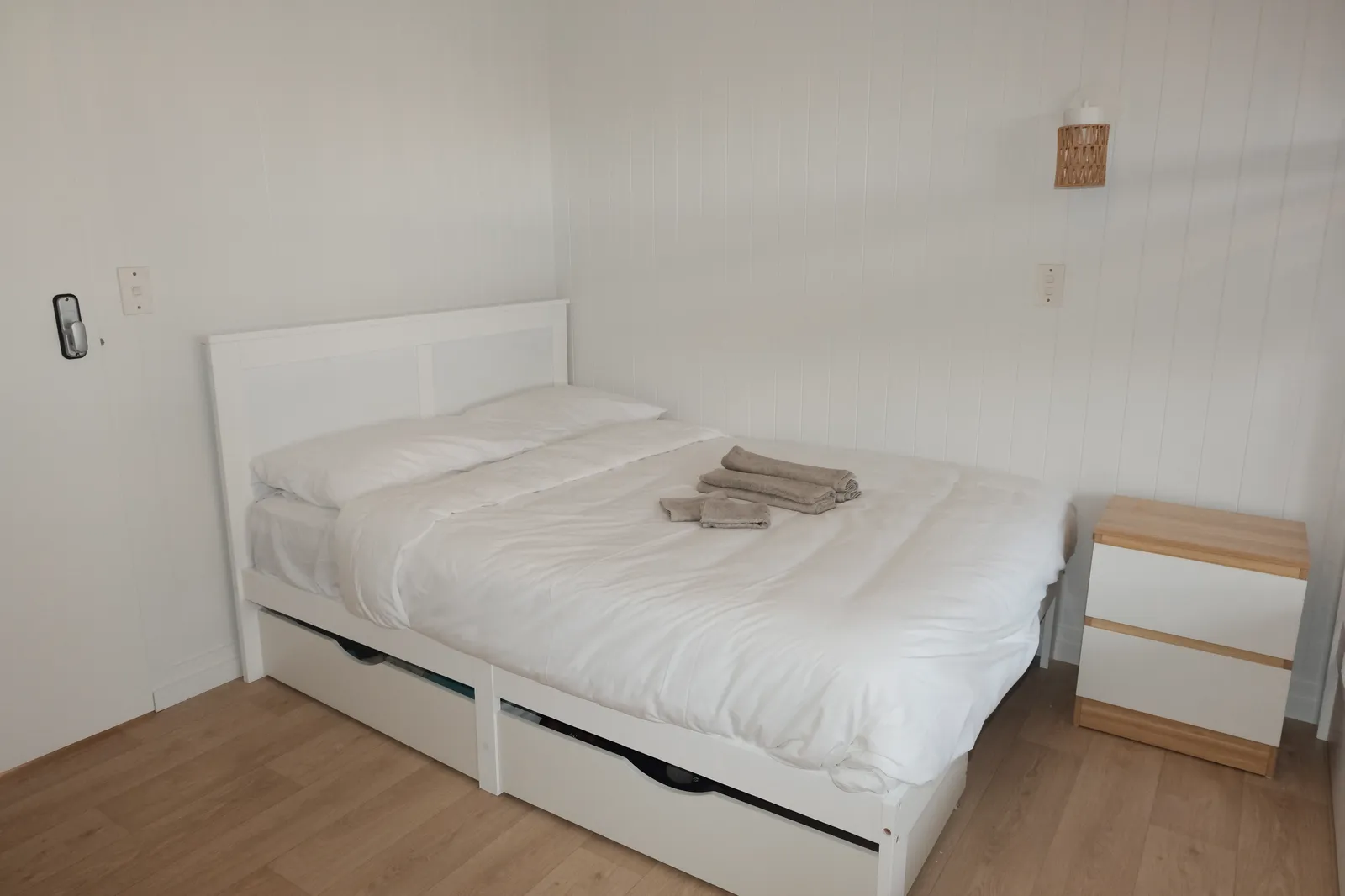 Queen room with fresh linen at Mangawhai Surf Lodge