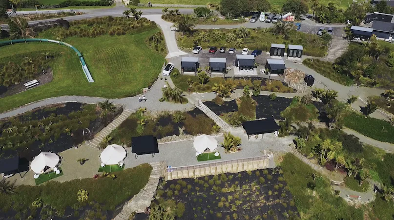 Drone view over the Te Arai pods and teepees