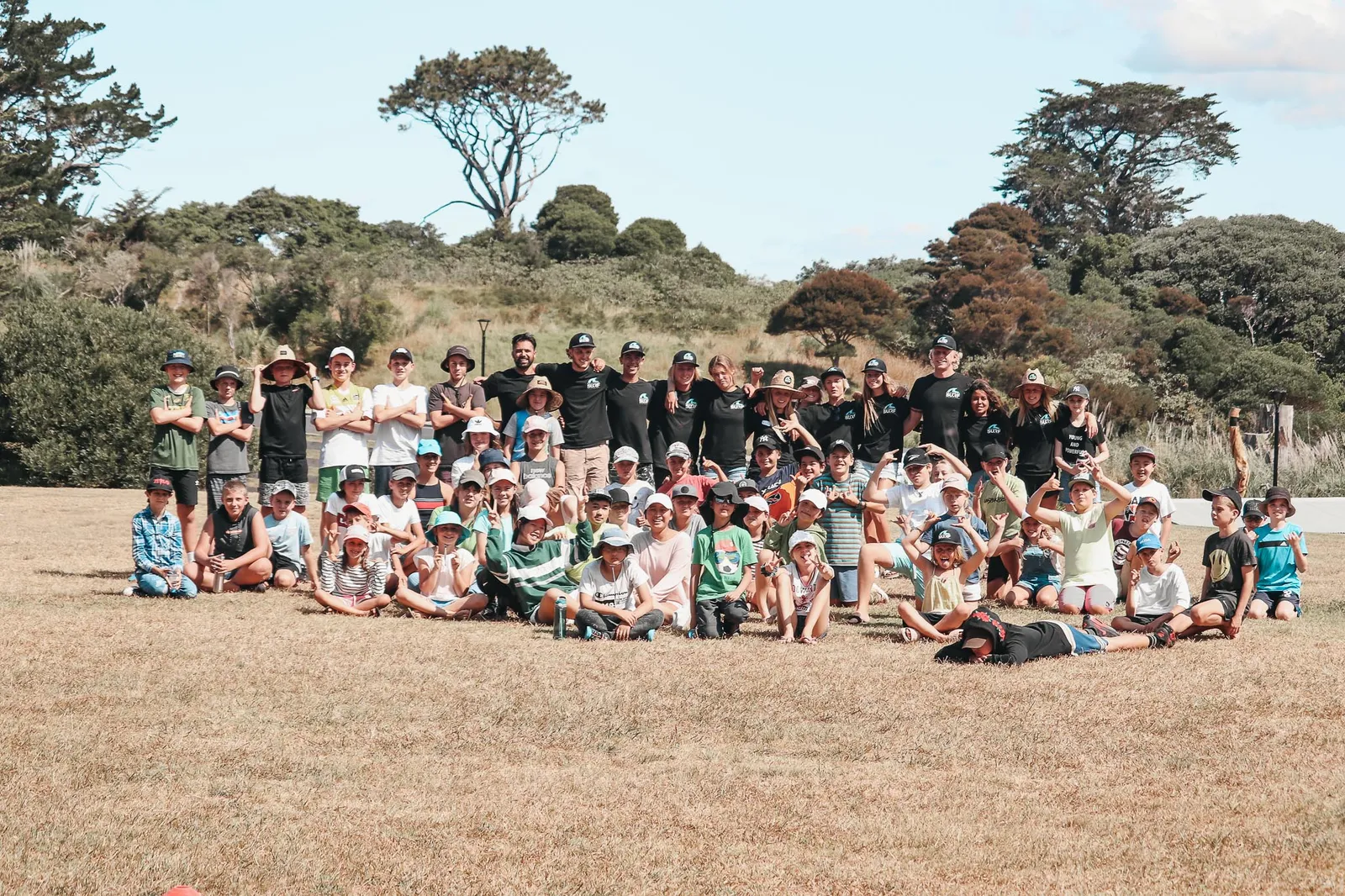 The whole camp gathered under the big tree